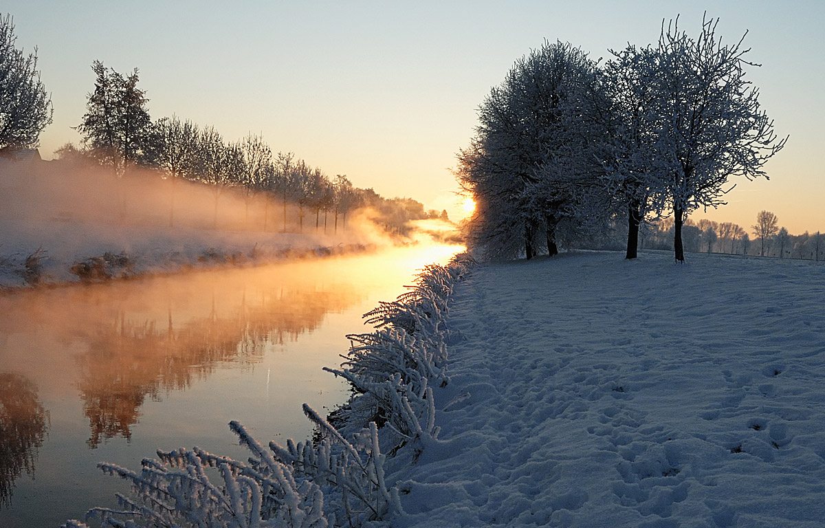 Winterlandschaft mit Sonne